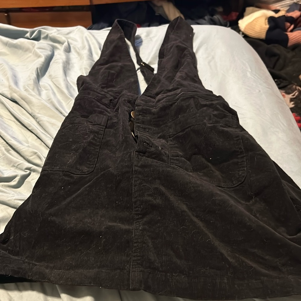 Jean dress has pockets and buttons